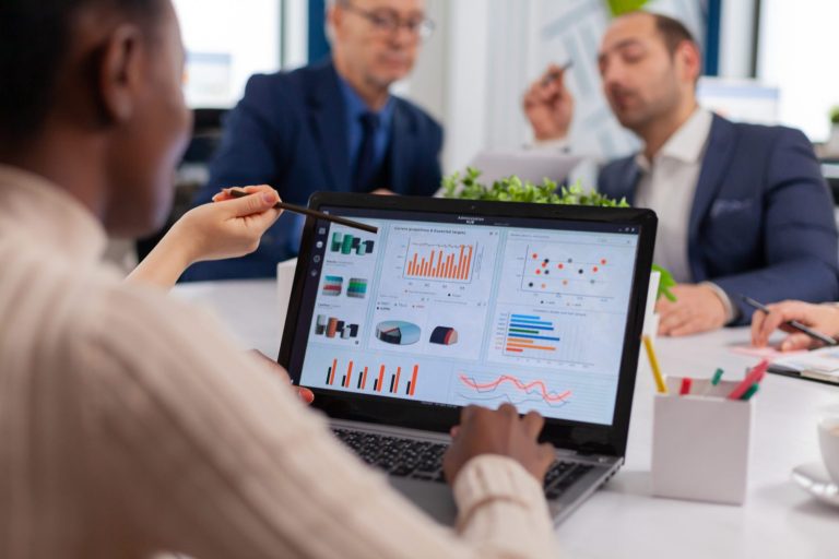 multi ethnic business team sitting table office center speaking about project during meeting broadroom scaled qdtddf9qqnaezlirmmhmkq6cb1faprb7xkg0h3etxs